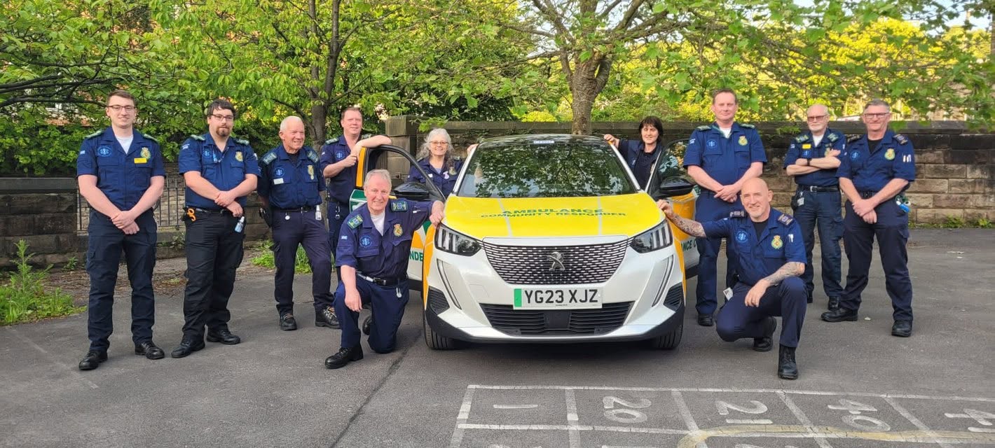 Amber Community First Responders with scheme vehicle CFR07